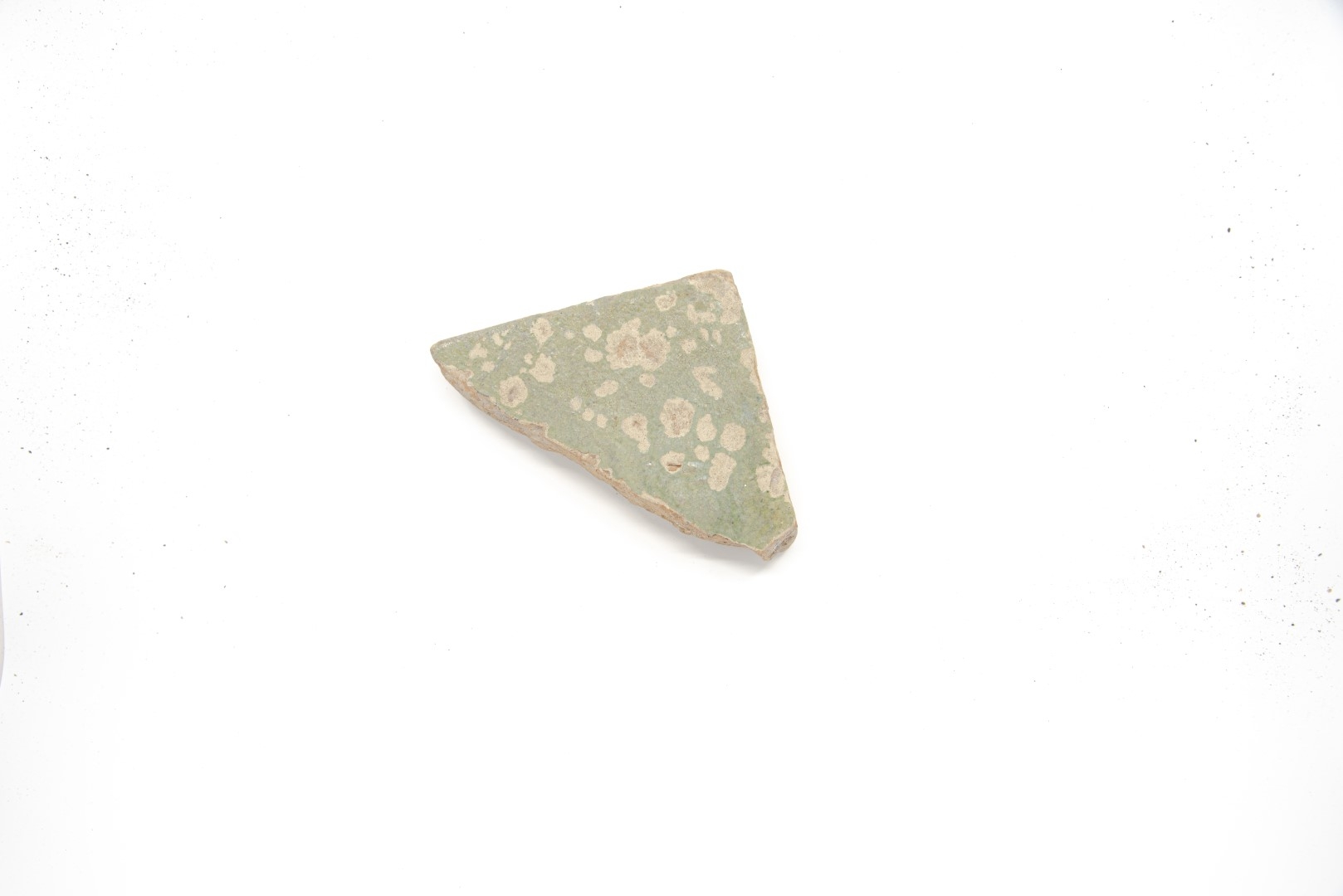 Green triangular tile